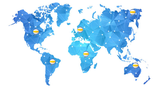 world map with beach volleyball balls as pins